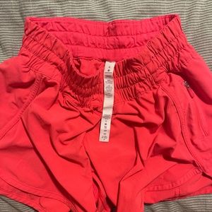 Hot pink running shorts